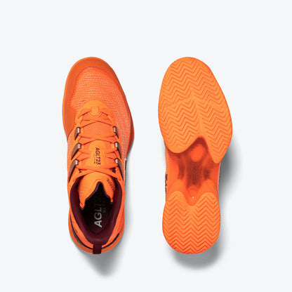 Performance-boosting Lacoste AG-LT23 Ultra Men's Tennis Shoes in Vibrant Orange, offering optimal stability and energy return