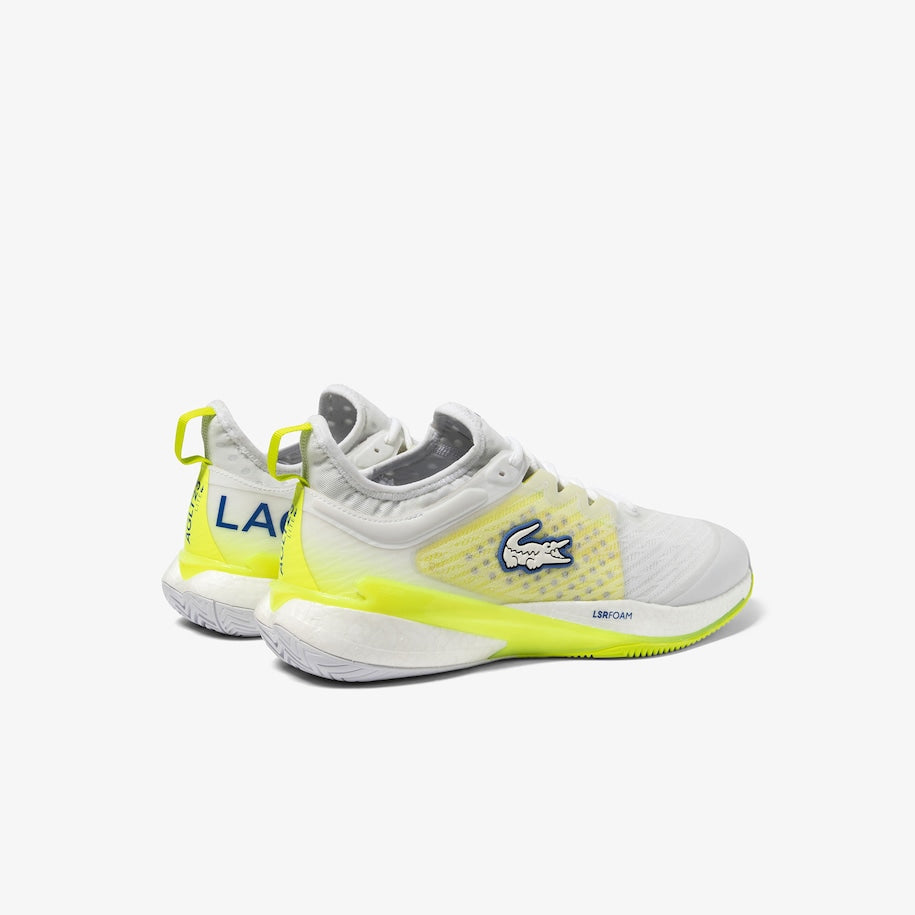 Lacoste AG-LT23 Lite Men's Tennis Shoes in White/Yellow, showcasing innovative design and supreme comfort